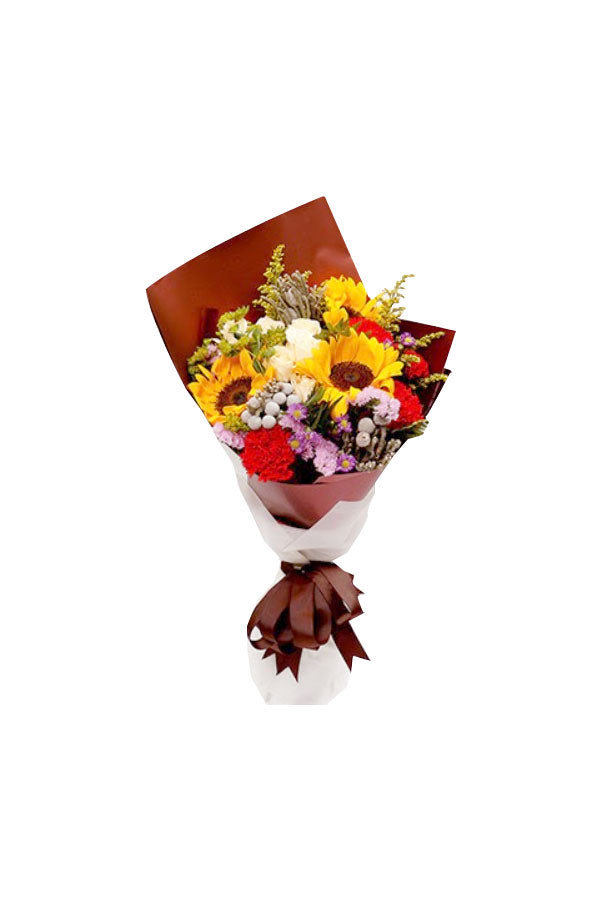 A vibrant mixed flower bouquet featuring sunflowers and seasonal blooms