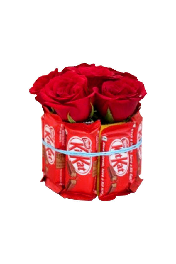 Elegant floral gift combining roses with premium chocolates