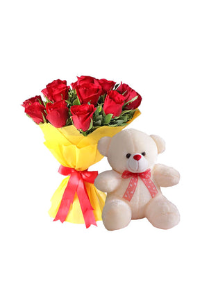 Floral gift set featuring red and yellow roses with teddy bear