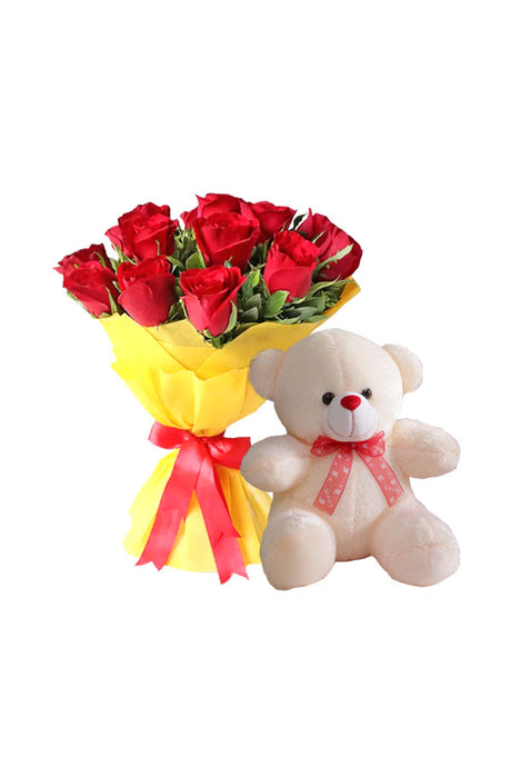 Floral gift set featuring red and yellow roses with teddy bear
