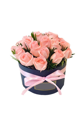 Cuddle Plush Flower Gift Box featuring fresh flowers and an adorable plush toy, elegantly arranged in a luxurious gift box, perfect for gifting on special occasions.
