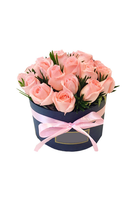 Cuddle Plush Flower Gift Box featuring fresh flowers and an adorable plush toy, elegantly arranged in a luxurious gift box, perfect for gifting on special occasions.
