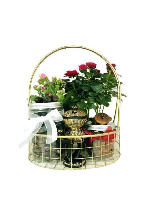 Ramadan gift hamper combining indoor plant and decorative items
