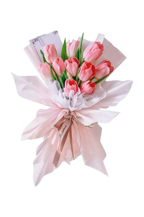 Elegant pink tulip floral arrangement with green fillers