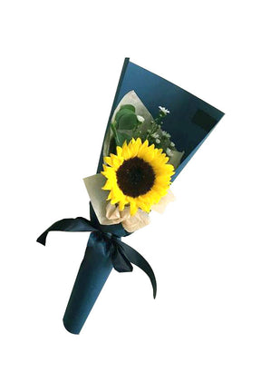 Single sunflower bouquet with baby’s breath fillers, black wrapping, and fresh green leaves floral gift
